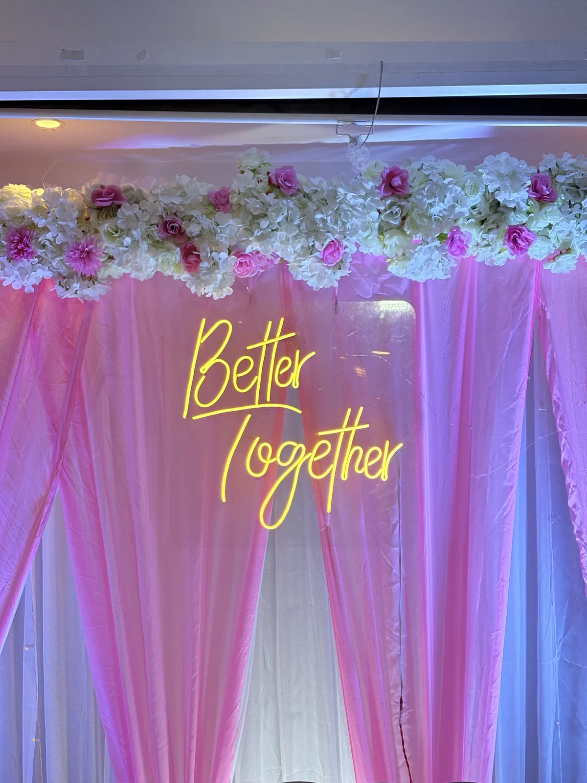 Decorated party stage with balloon arch at JK Hotel C R Park banquet venue