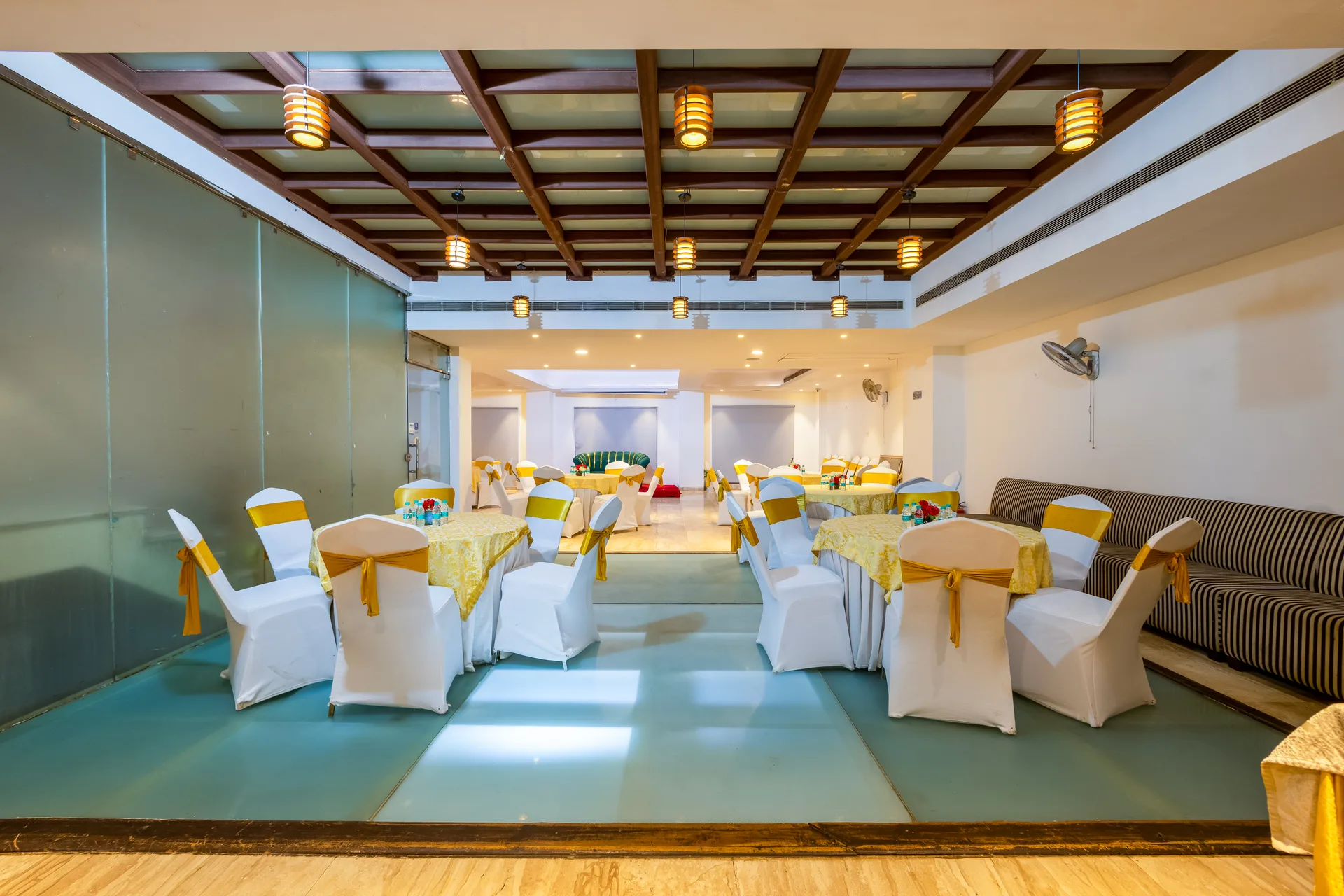JK Hotel banquet hall with pink and gold ceiling balloon decorations for a celebration event