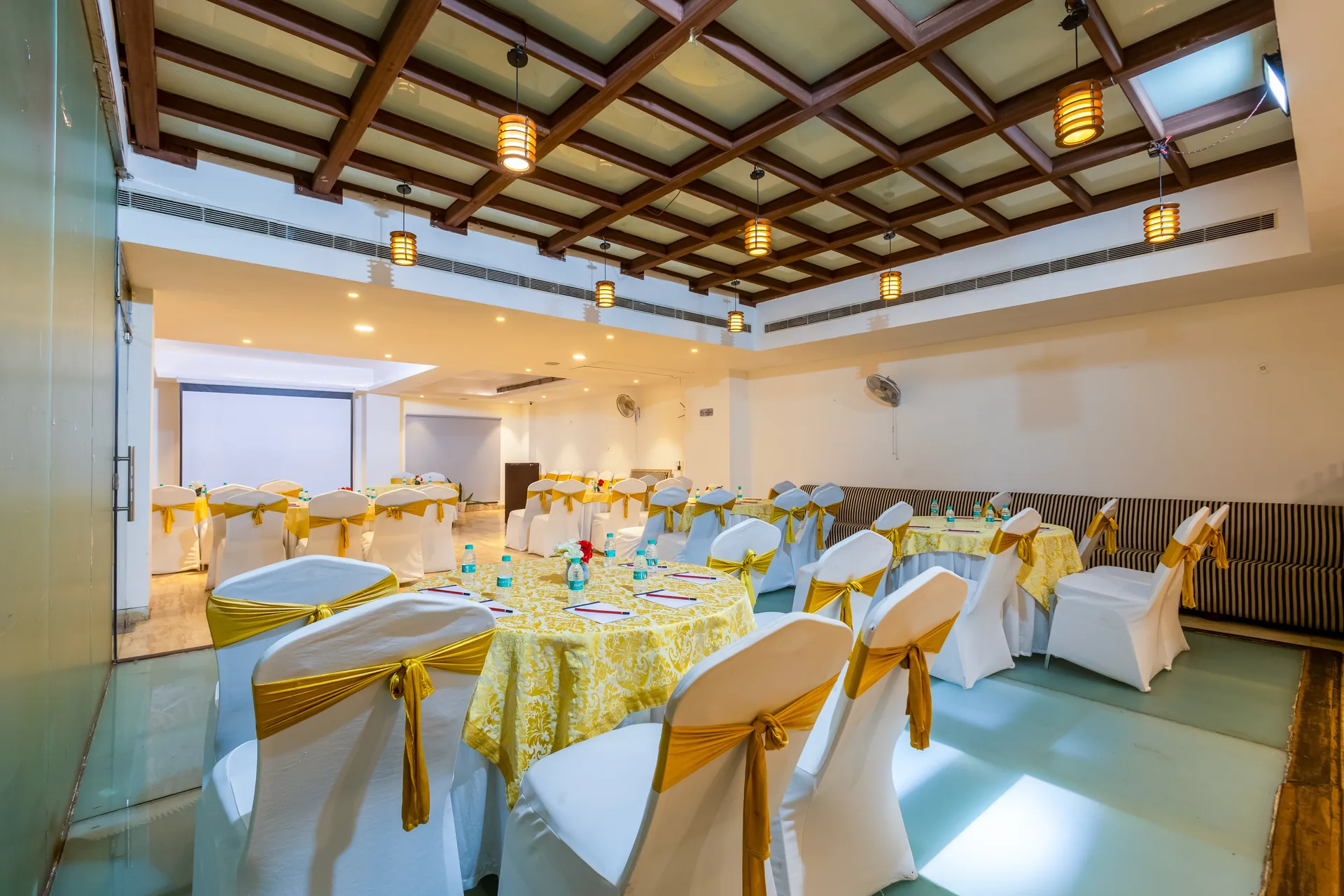 JK Hotel banquet hall with round table banquet-style seating JK Hotel banquet hall with round table banquet-style seating
