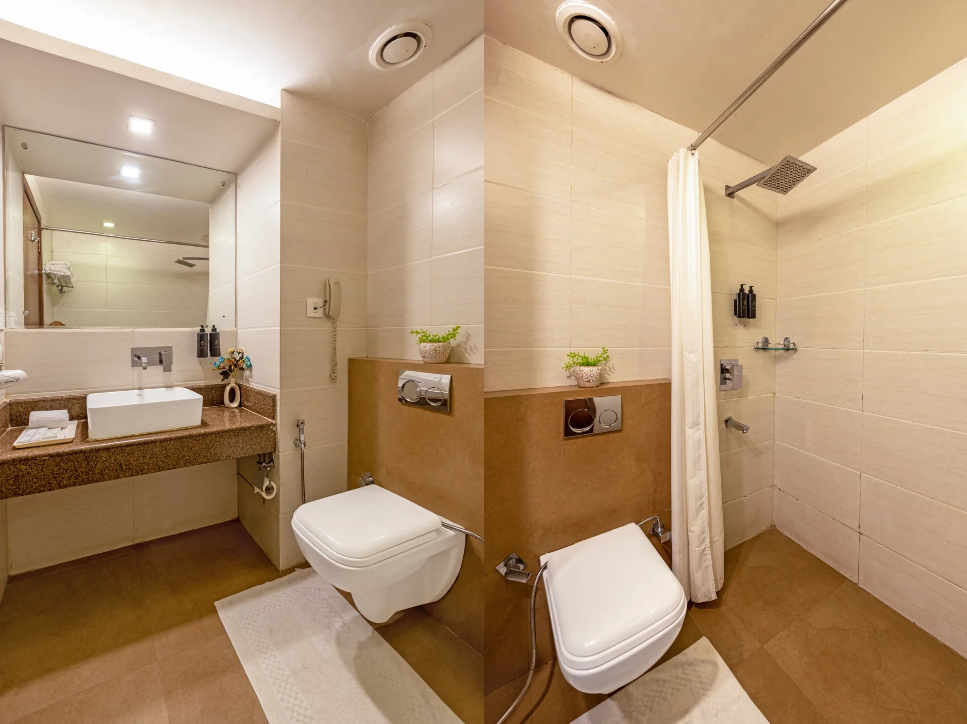 JK Hotel en-suite bathroom with shower and modern fixtures JK Hotel en-suite bathroom with shower and modern fixtures