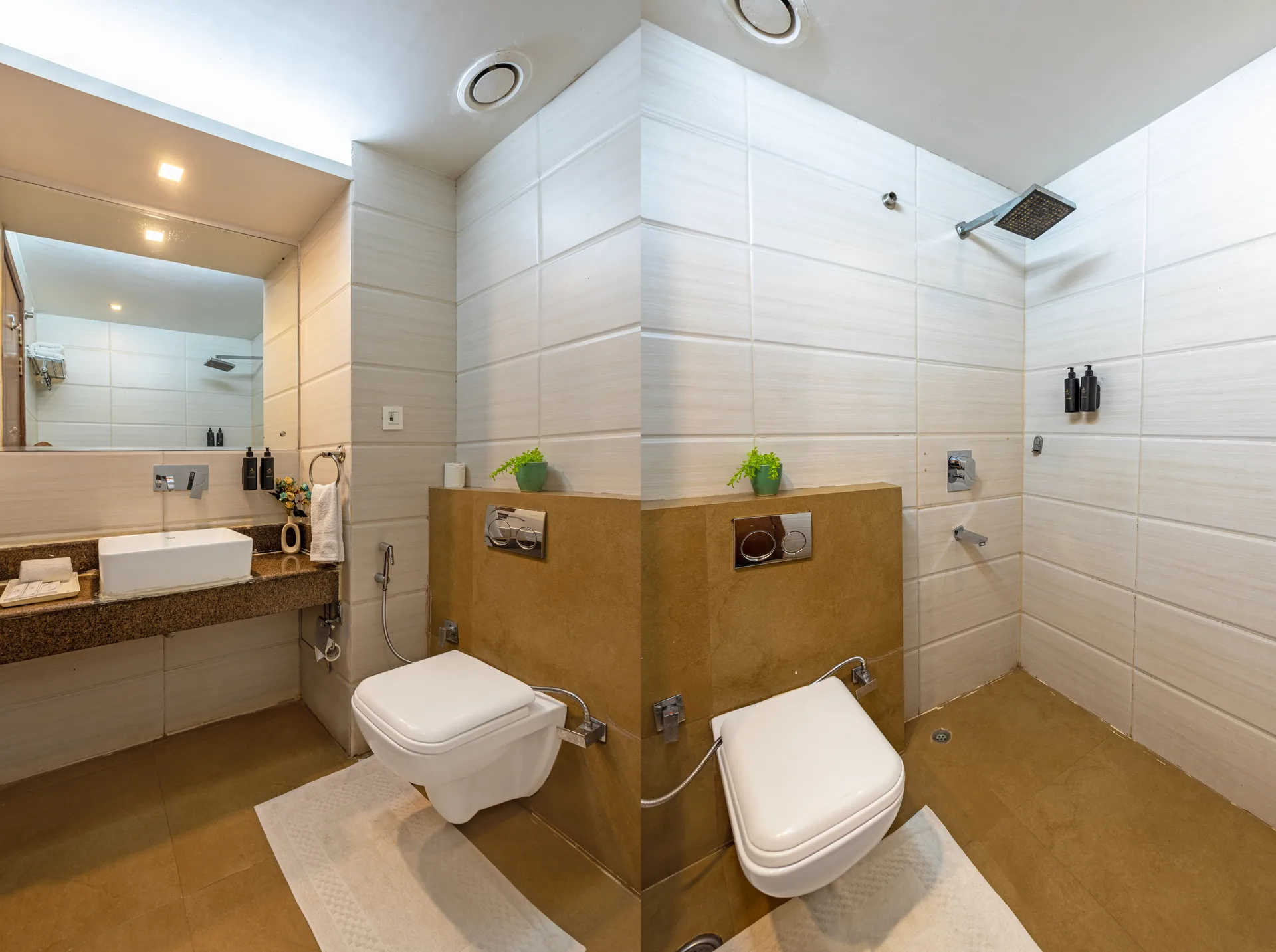 JK Hotel premium bathroom with walk-in shower and dual fixtures JK Hotel premium bathroom with walk-in shower and dual fixtures