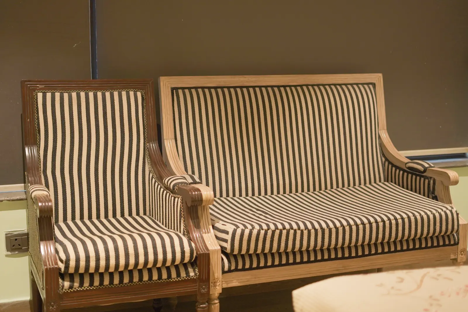 Lounge seating area at The JK Hotel C R Park, South Delhi